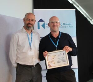 Dominic Norwell (right) collects his Highly Commended award from Chris Knowles